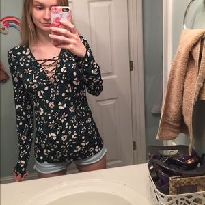 Silky darkgreen flower blouse with string on front